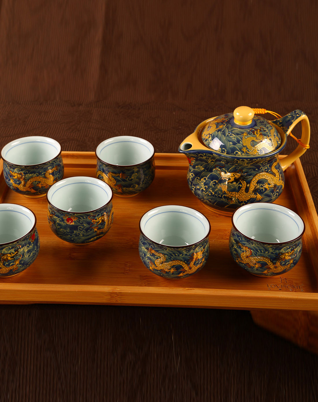 > 商品详情 品牌名称:乐巢lovhome 商品名称:蓝釉金龙7入中式富贵茶具